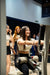Athlete gripping the support handles on the Gluteleader Standing Hip Thrust GL-1004